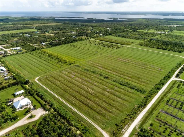 Birds eye view of property featuring a rural view