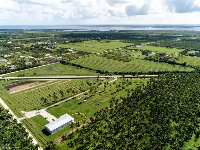 Drone / aerial view with a rural view and a water view