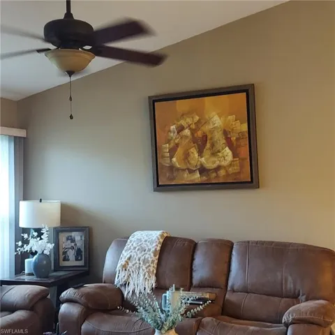 Living area with a ceiling fan