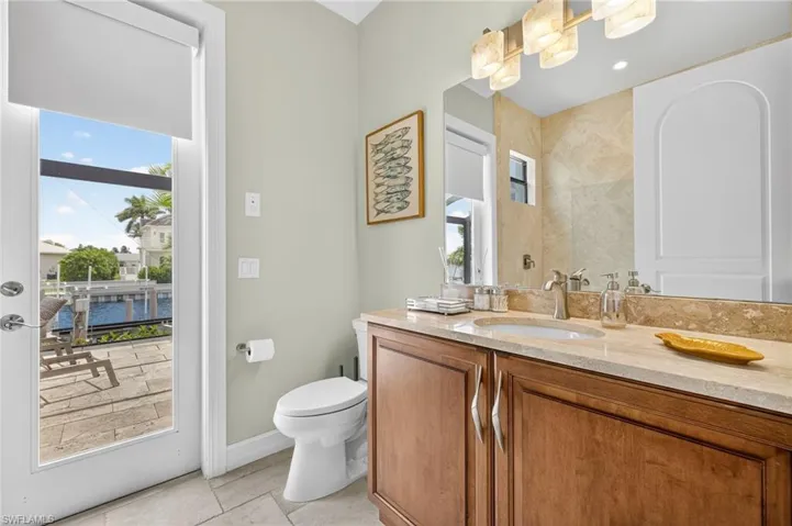 Bathroom with vanity and tile patterned flooring