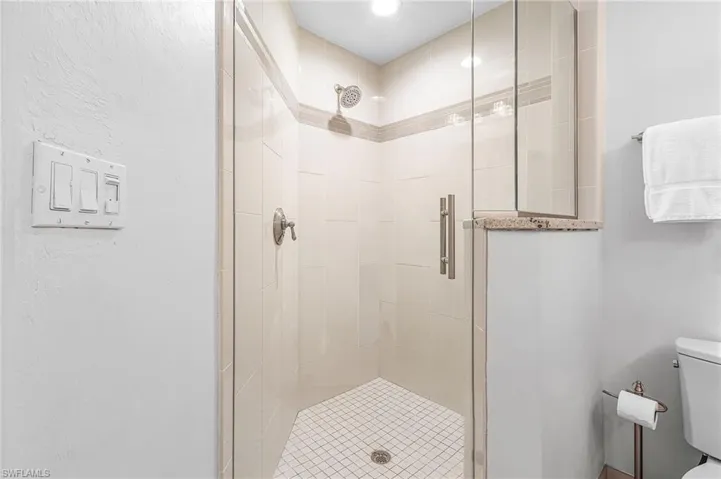 Large, tiled, walk-in shower in the owner's bath.