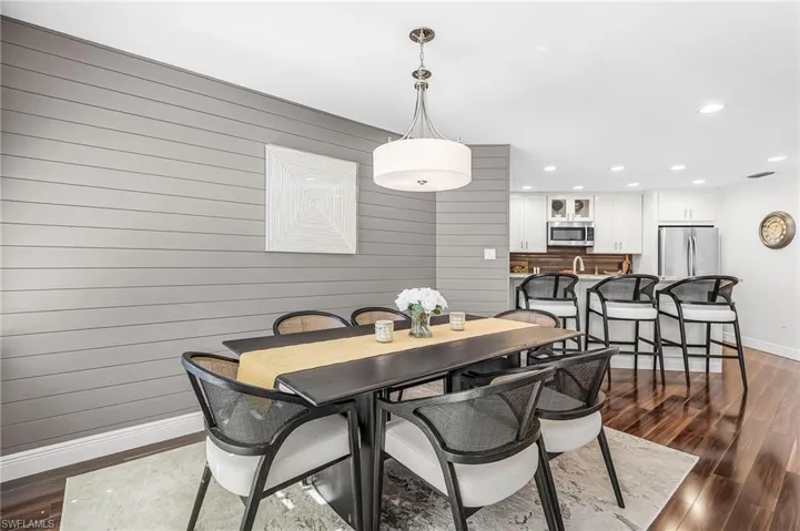 Stylish dining area is open to the great room and to the kitchen.