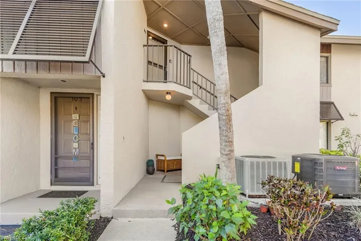 Stairwell entry to the front of this condo.