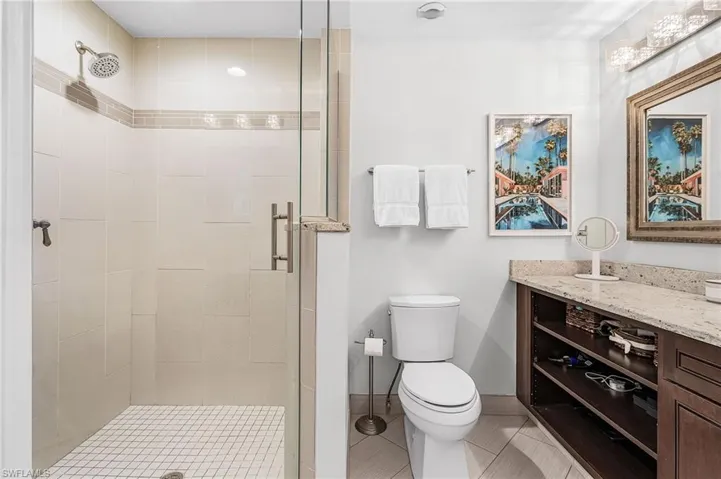 Large, tiled, walk-in shower in the owner's bath.