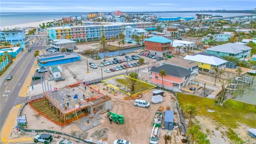 Aerial view featuring a water view (Photos may be virtually enhanced)