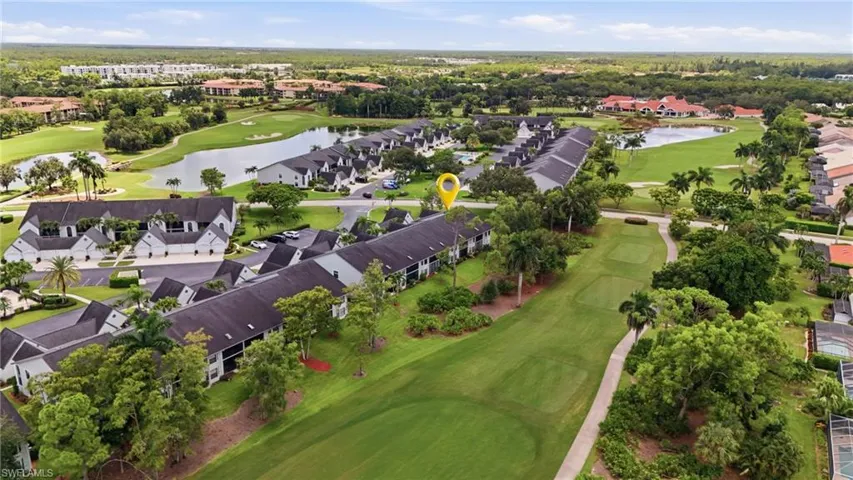Lush golf course frontage with mature landscaping