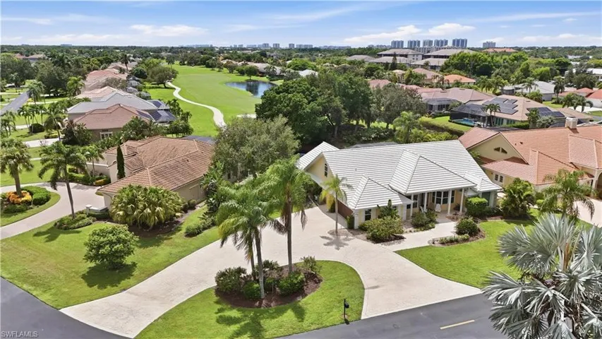 Aerial view of the property and surrounding neighborhood.