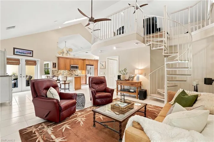 Spacious family room with soaring ceilings and an open, airy feel.