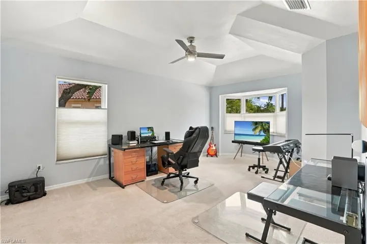 Guest bedroom currently being utilized as a home office/work space.