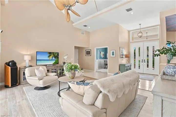 Living area with natural light and access to the outdoor living space.