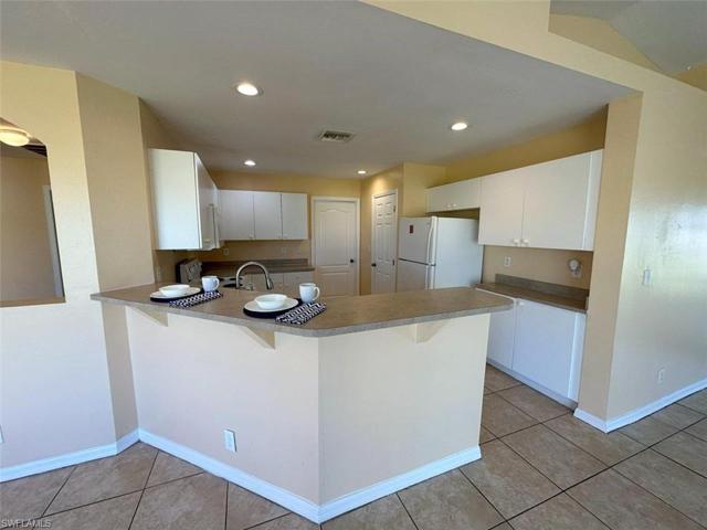 1313 NE 9th  AVE, CAPE CORAL, FL 33909