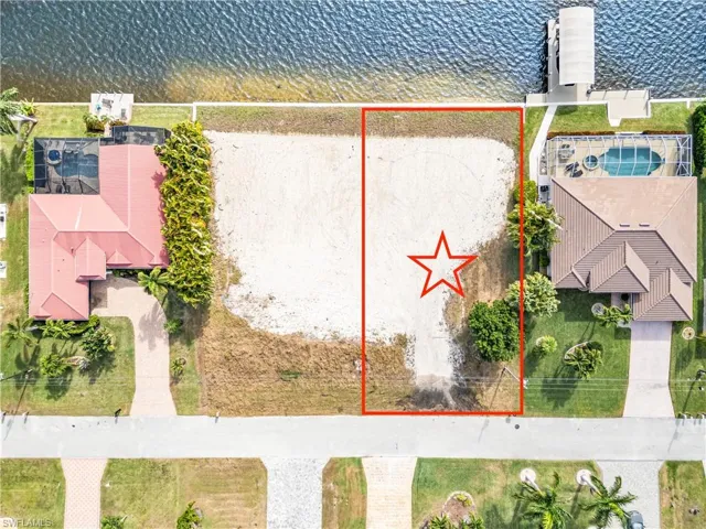 View of property location featuring a nearby body of water and property parcel outlined