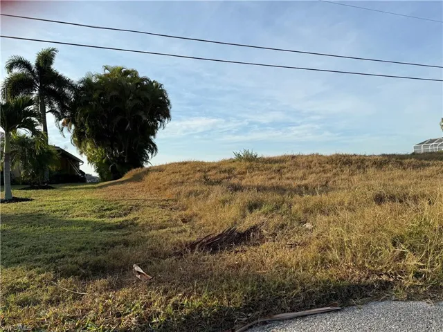 View of site with additional fill vs neighboring home