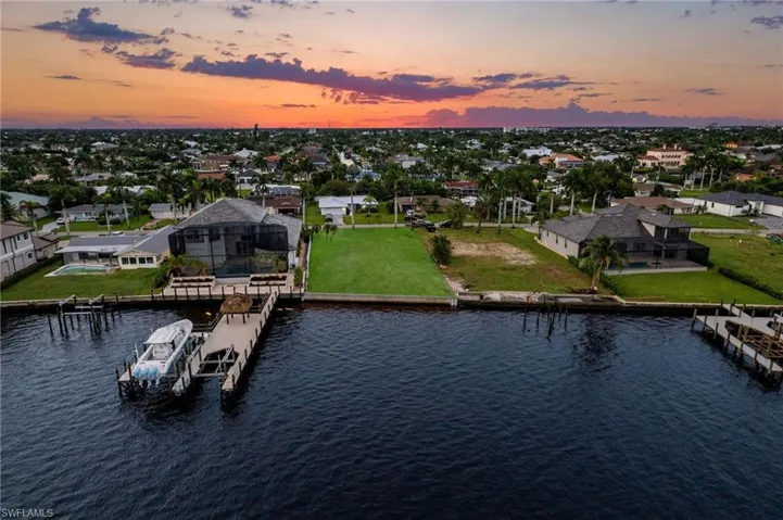 Aerial view at dusk with a water view