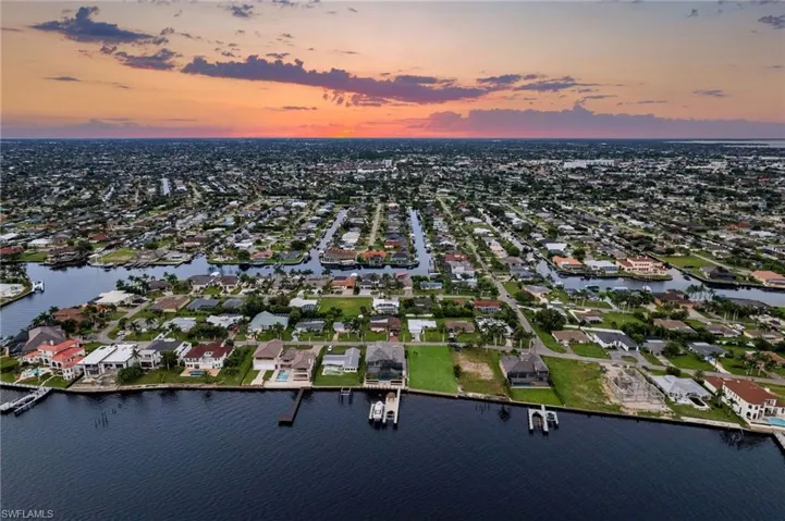 Aerial view at dusk with a water view
