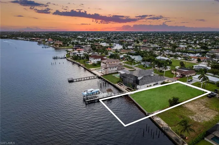 Aerial view at dusk with a water view