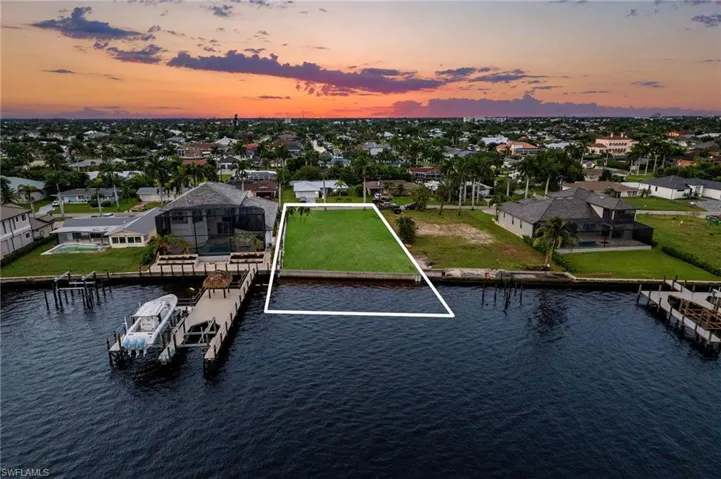 Aerial view at dusk with a water view