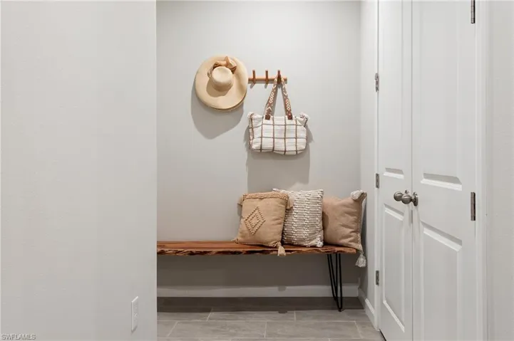 Mudroom featuring baseboards