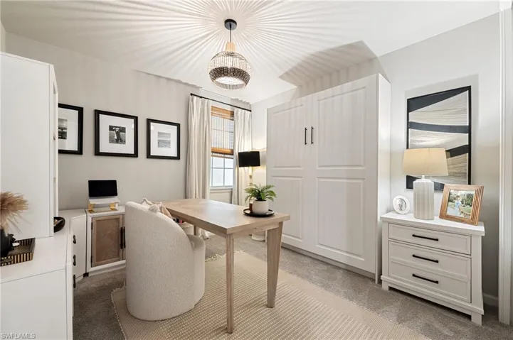 Home office with light carpet