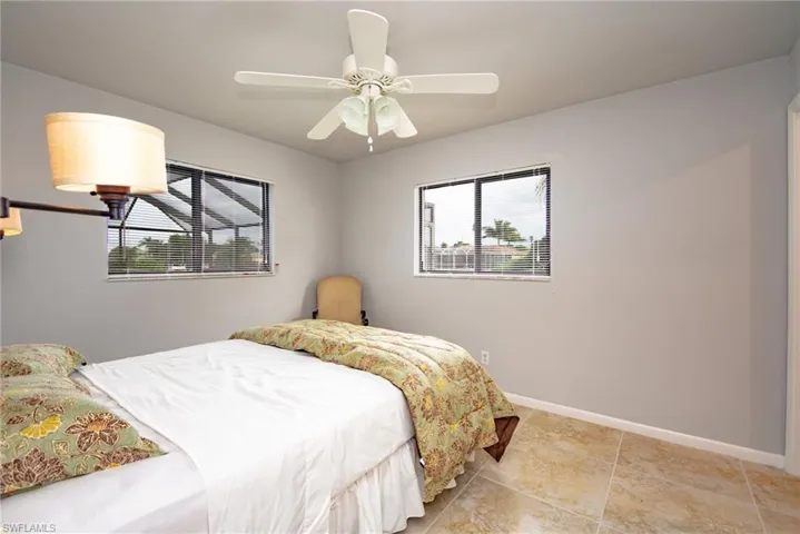 Neutral-toned walls complement the tile flooring