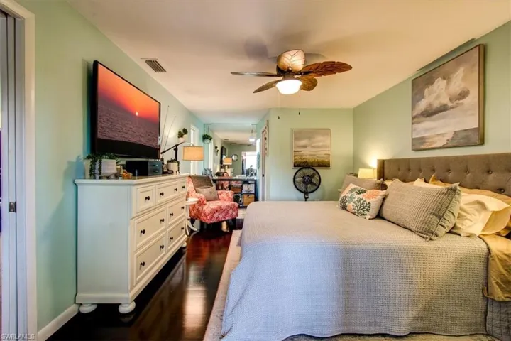 Master suite with beautiful wood floors