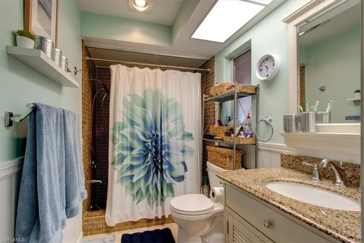 Updated master bathroom with tiled shower