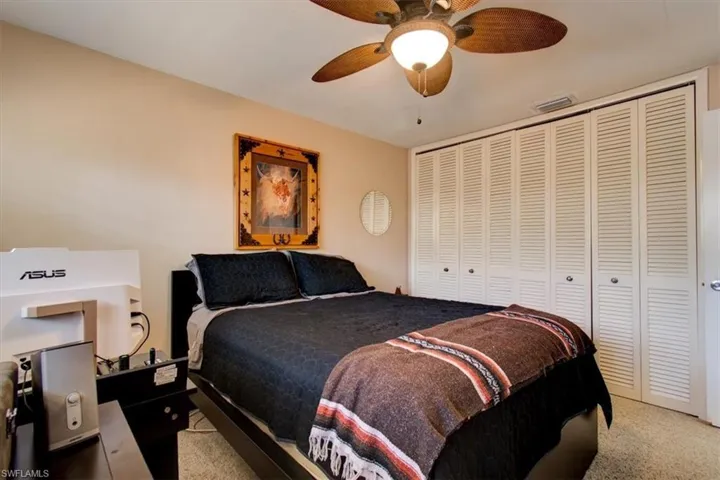 Guest bedroom with large wall-to-wall closets