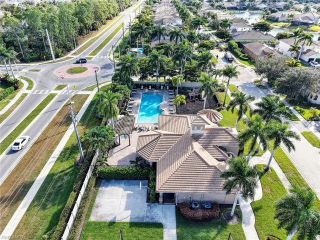 Aerial view of residential area with a pool
