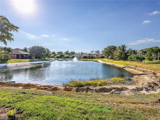 Water view with nearby suburban area