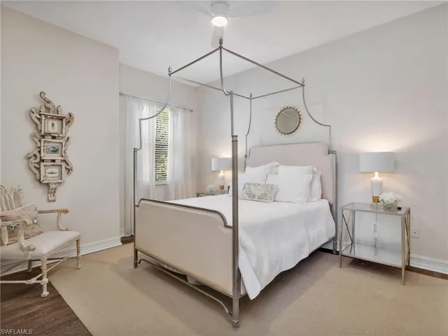 Bedroom with baseboards and ceiling fan