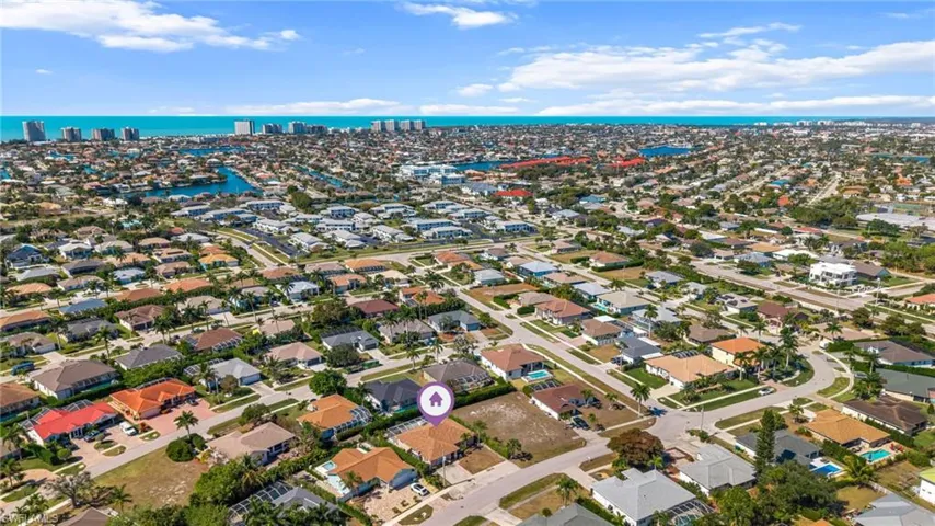 View of urban area featuring a large body of water and nearby suburban area