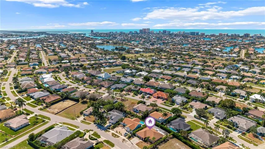 View of urban area with a large body of water and nearby suburban area