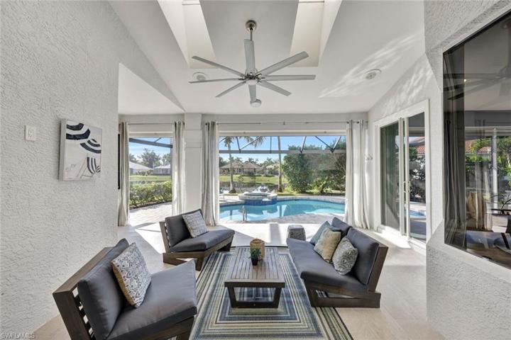 Covered lanai space serves as perfect place to unwind and relax. Gas grill is also under covered space.