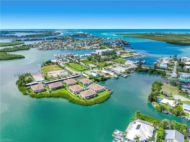 Aerial view of residential area with a nearby body of water