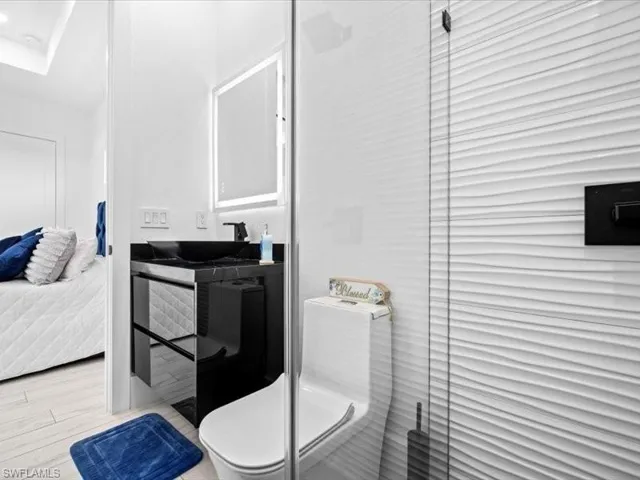 Bathroom featuring toilet and vanity