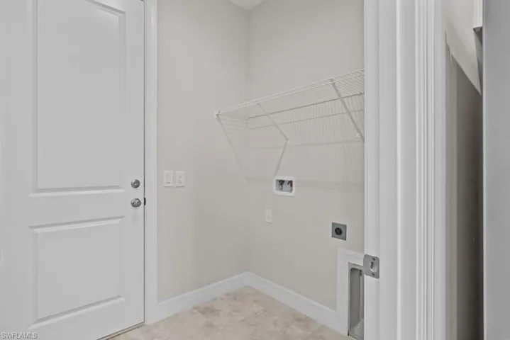 Laundry room featuring hookup for a washing machine and electric dryer hookup