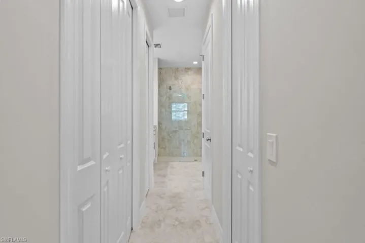 Corridor with recessed lighting Double Master Closets