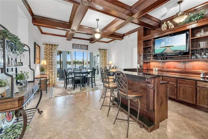 Built in bar with wood beams
