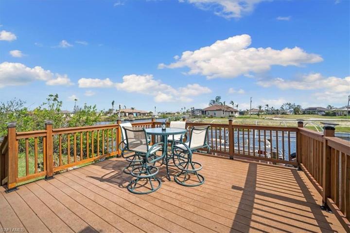 2 HUGE deck areas. This one is elevated and outside but connected to the cage. Both overlook the gorgeous water view.