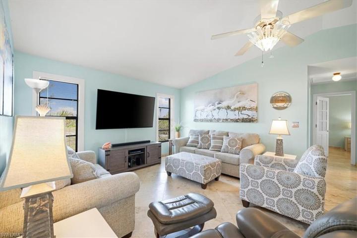 Large den is open to kitchen