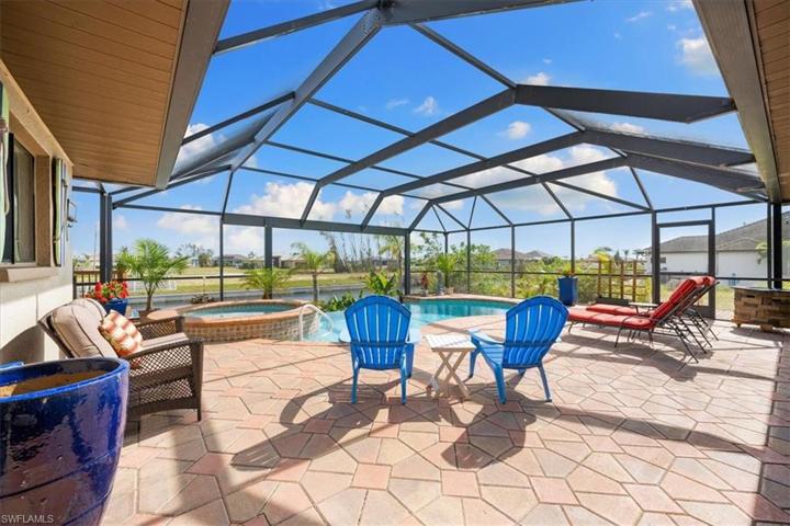 2 HUGE deck areas. This one is under the cage. Both overlook pool and water