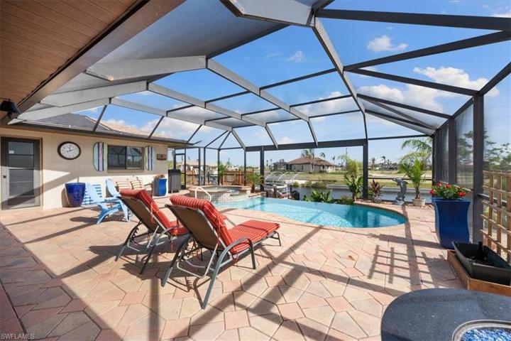 2 HUGE deck areas. This one is under the cage. Both overlook pool and water
