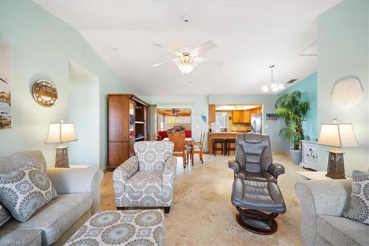 Large den is open to kitchen