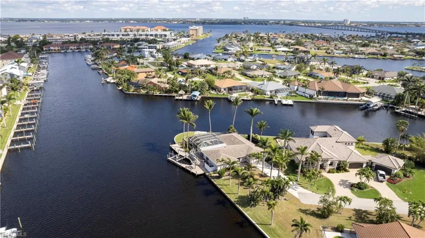 Bird's eye view with a water view and a residential view