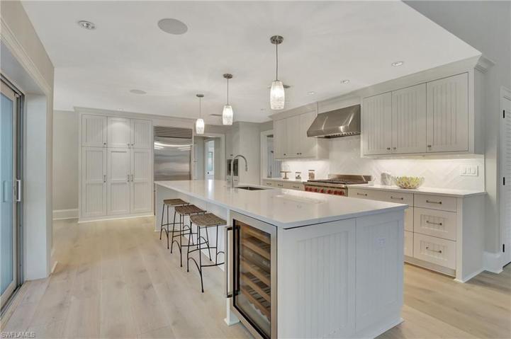 Kitchen Showing Island Breakfast Area With Wine Cooler Showing Sub-Zero Refrigerator