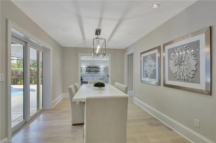 Dining Room Looking Towards Pool Room Which Can Be Utilized As A Den Or Second Office
