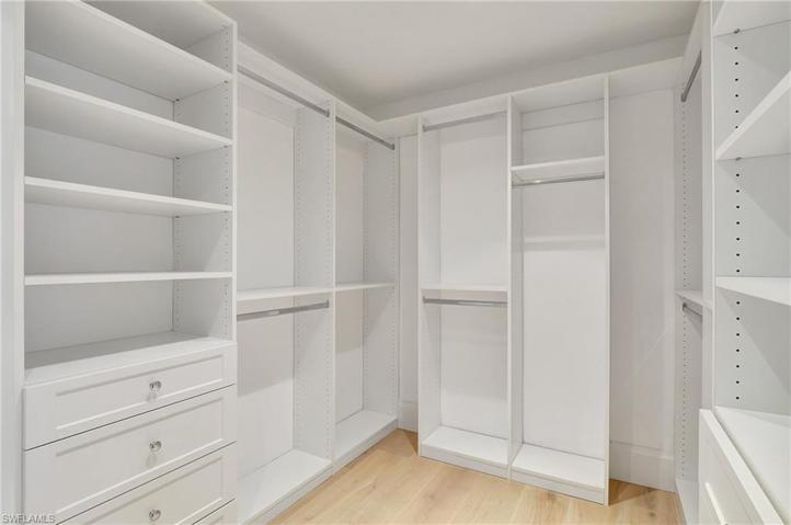 Spacious Master Bedroom Suite Custom Walk-In Closet