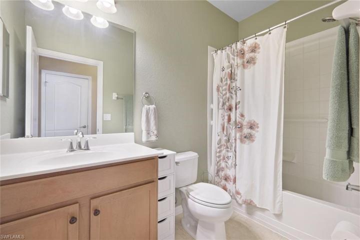 Third full bathroom located in hallway between third and fourth bedroom.
