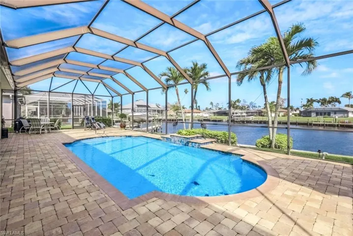 View of swimming pool with a panoramic water view