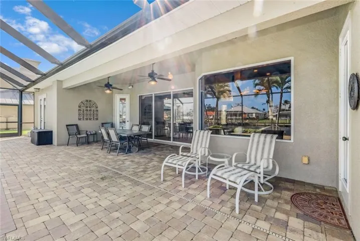 View of oversize pool deck and lanai